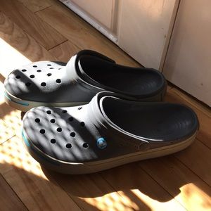 Gray and blue crocs